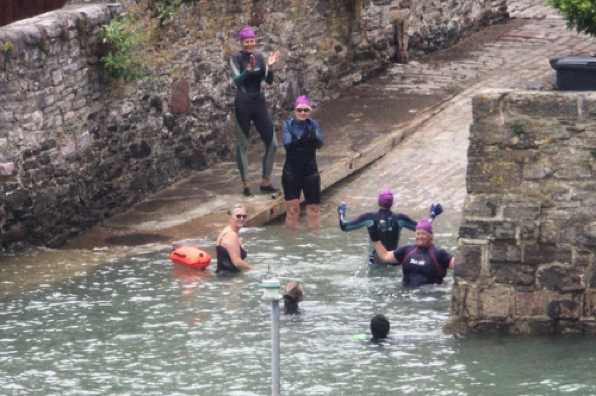 27 June 2020 - 10-34-47
Some ladies here are quite rightly very pleased with themselves. They have just swum across the river Dart (and are about to swim back).
Surrounded by a safety team the four ladies in purple hats were delighted with their effort. Great to see. 
-------------------------------------------
Swim across river Dart, Dartmouth